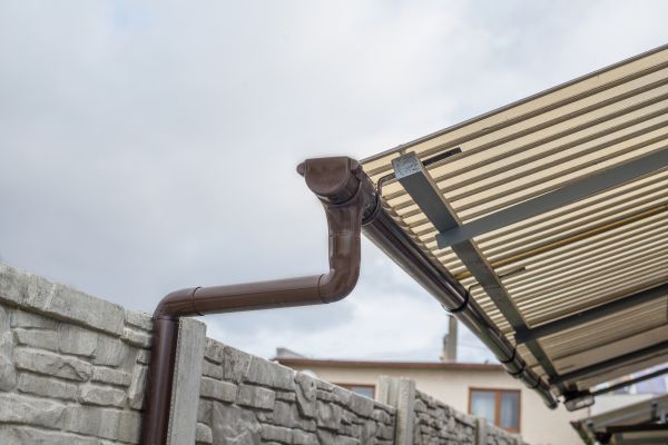 Plastic Downspout Installation in Galena
